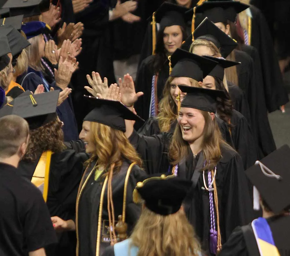 Students celebrating graduation